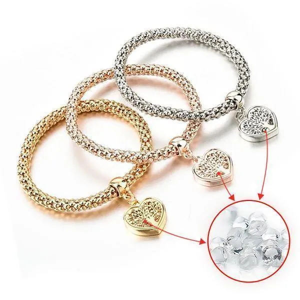 A TREE OF LIFE" HEART EDITION CHARM BRACELET WITH AUSTRIAN CRYSTALS